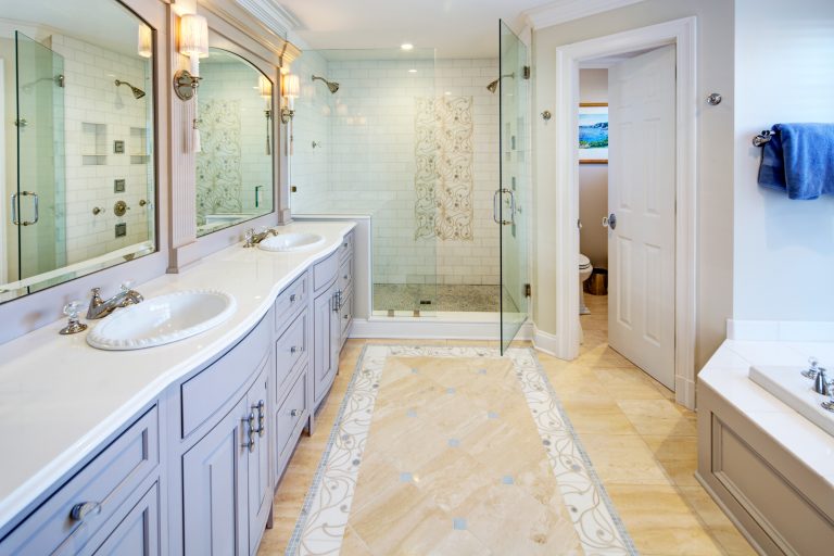 traditional style remodeled bathroom white double sink vanity separate tub and shower