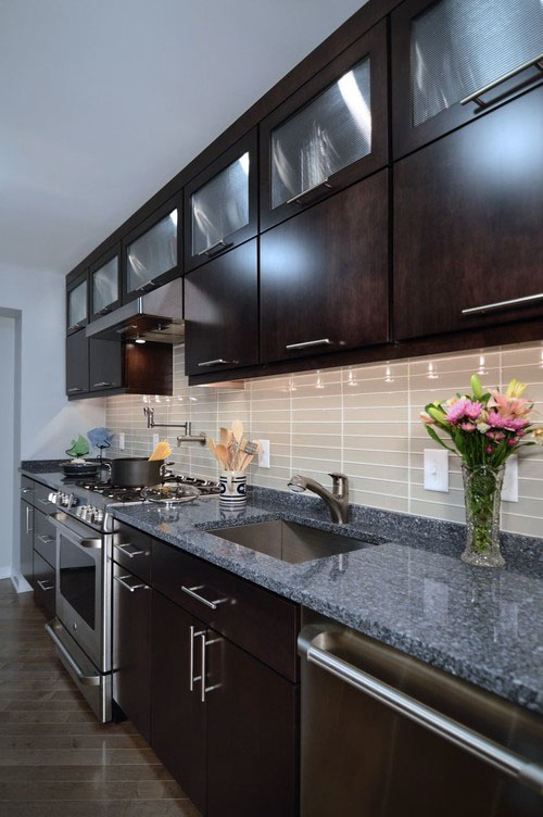 Kitchen with dark cabinets