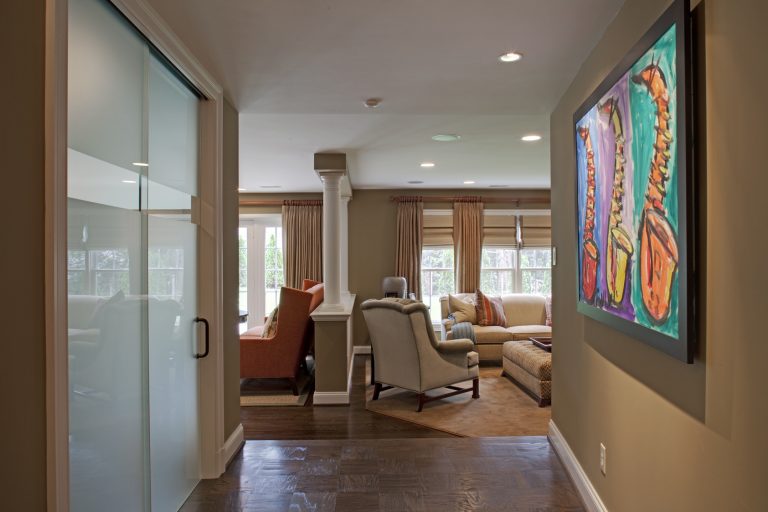 hallway into living area columns to define spaces