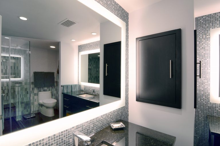 modern bathroom in dc condo backlit mirror tile wall feature