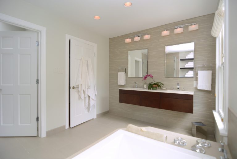 large and open renovated spa style bathroom double sink floating vanity
