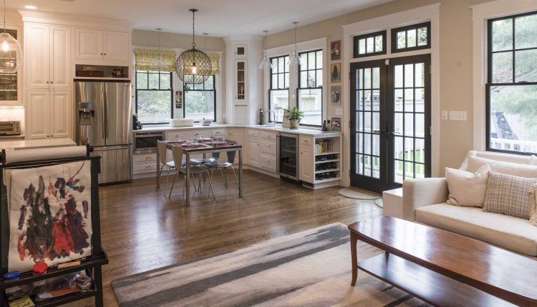 kitchen flows into living room bright and open french doors
