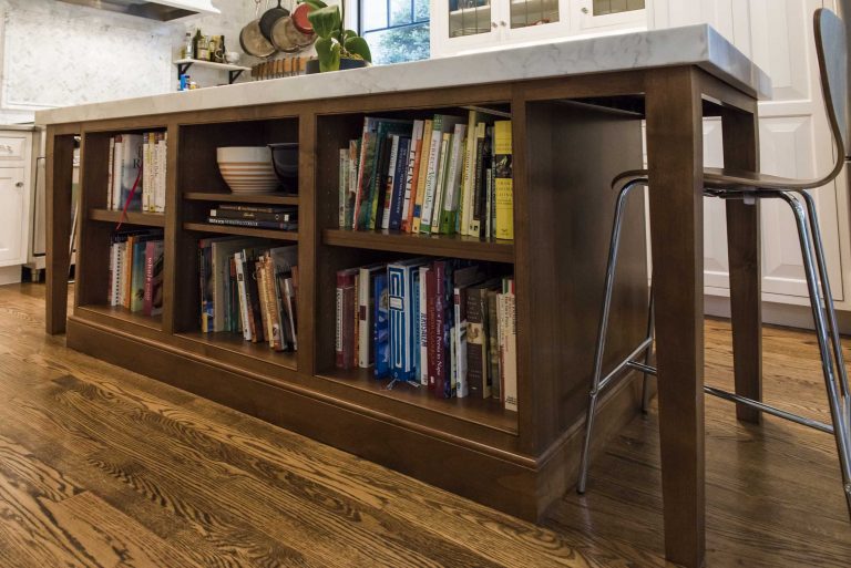 kitchen island with built-in shelving and storage