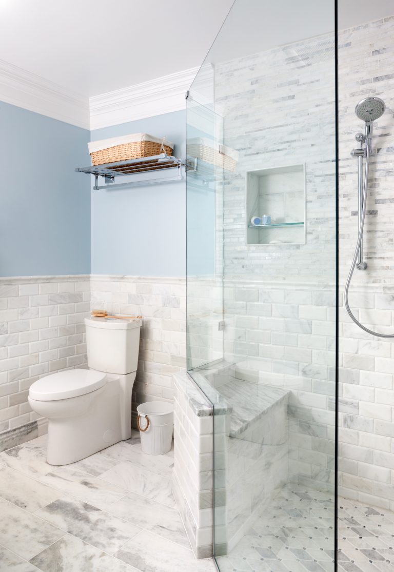 traditional farmhouse style bathroom blue and white separate shower stall with glass walls marble tile