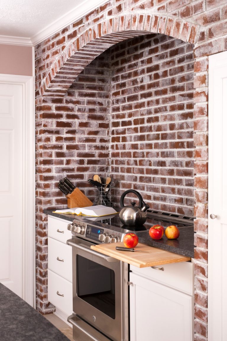 whitewashed original brick oven nook stainless steel oven