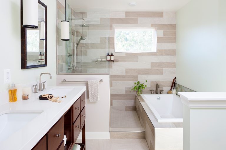 modern bathroom separate tub wood vanity natural color palette rain waterfall shower head