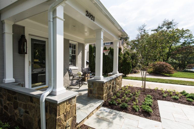 porch addition on virginia home flagstone floors and stone base with columns
