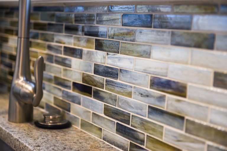 backsplash detail natural and green tones