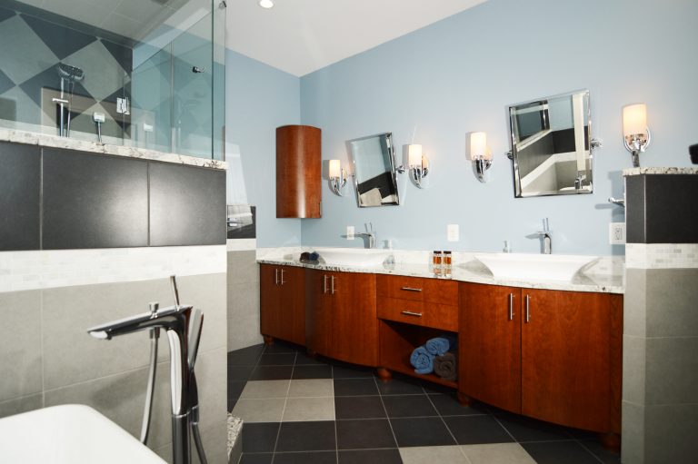 modern bathroom geometric tile black white and blue cherry wood double sink vanity