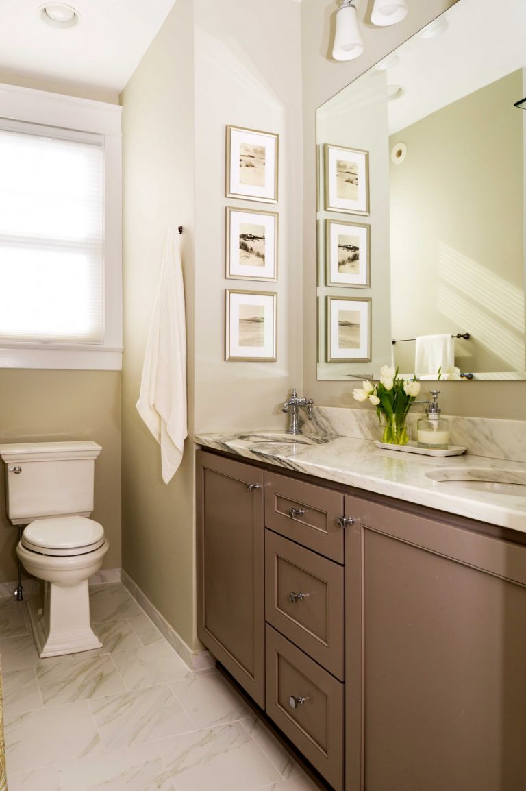 elegant bathroom in dc townhouse neutral color palette grey cabinetry marble floors and countertops double sink vanity