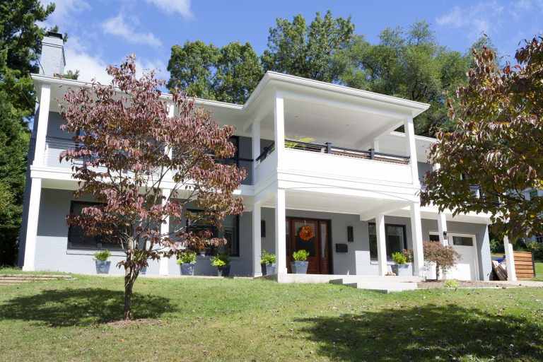 addition exterior two level front porch columns light blue white curb appeal