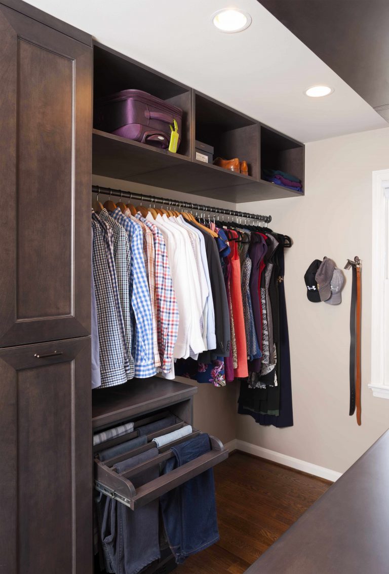 master bedroom walk in closet lots of storage and shelving