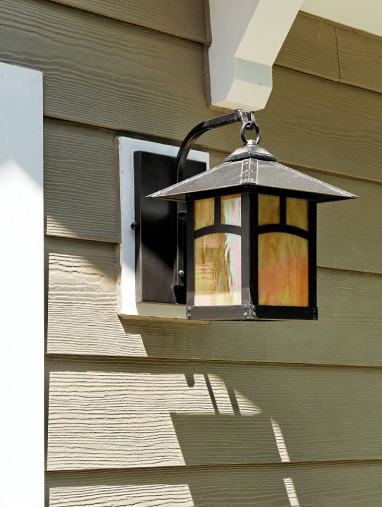 close-up of wall mounted sconce lantern outdoor lighting