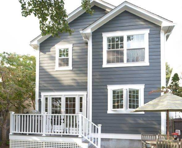 two-story addition with back deck and French doors gray blue craftsman