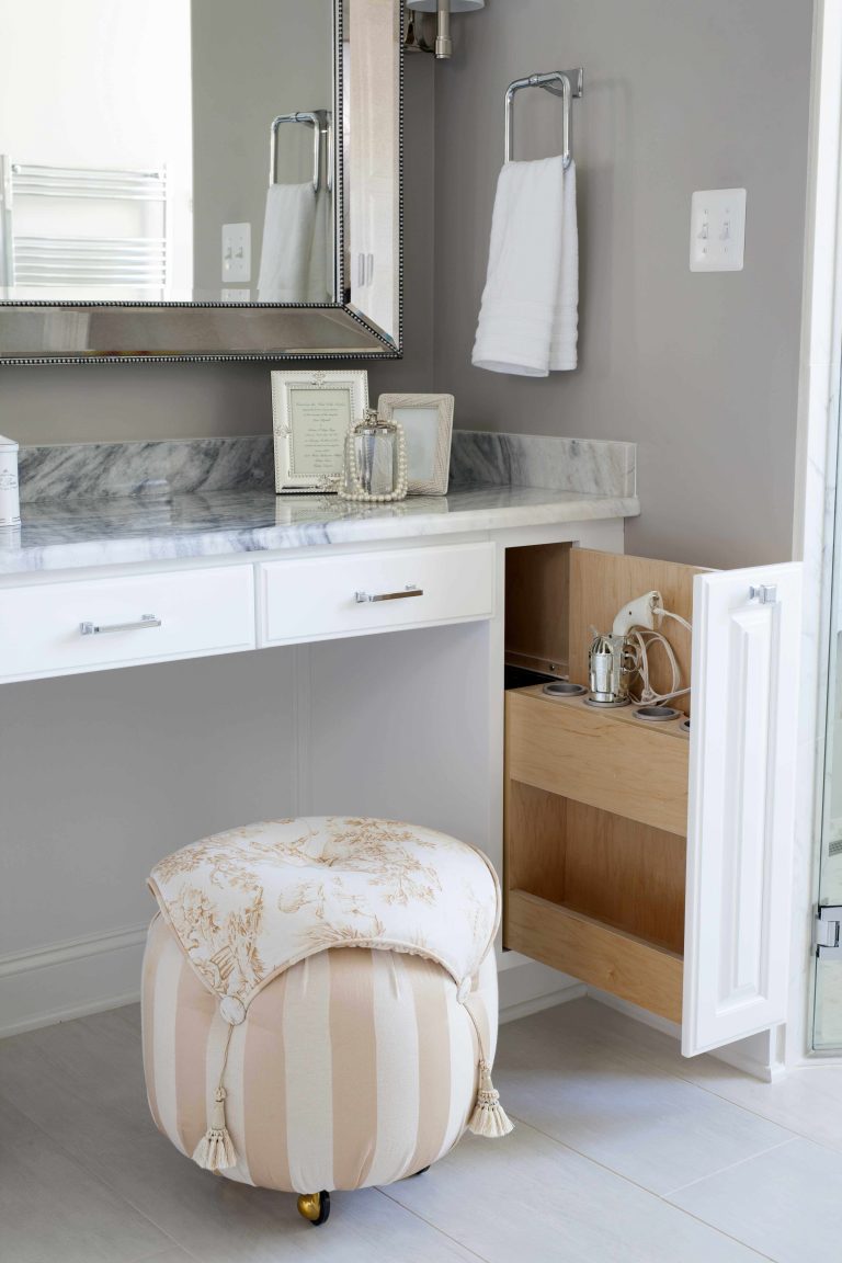 creative storage solutions at make up vanity in renovated bathroom