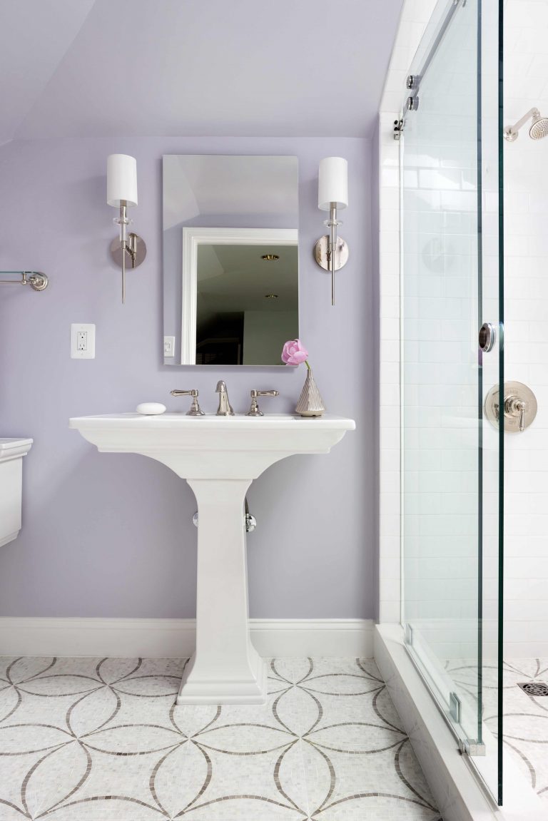bathroom with light purple walls tile floor design shower with glass door sconce lighting