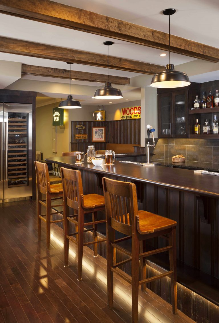 basement sports bar and pub wine refrigerator exposed beams