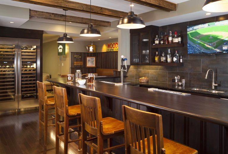 basement sports bar and pub wine refrigerator exposed beams