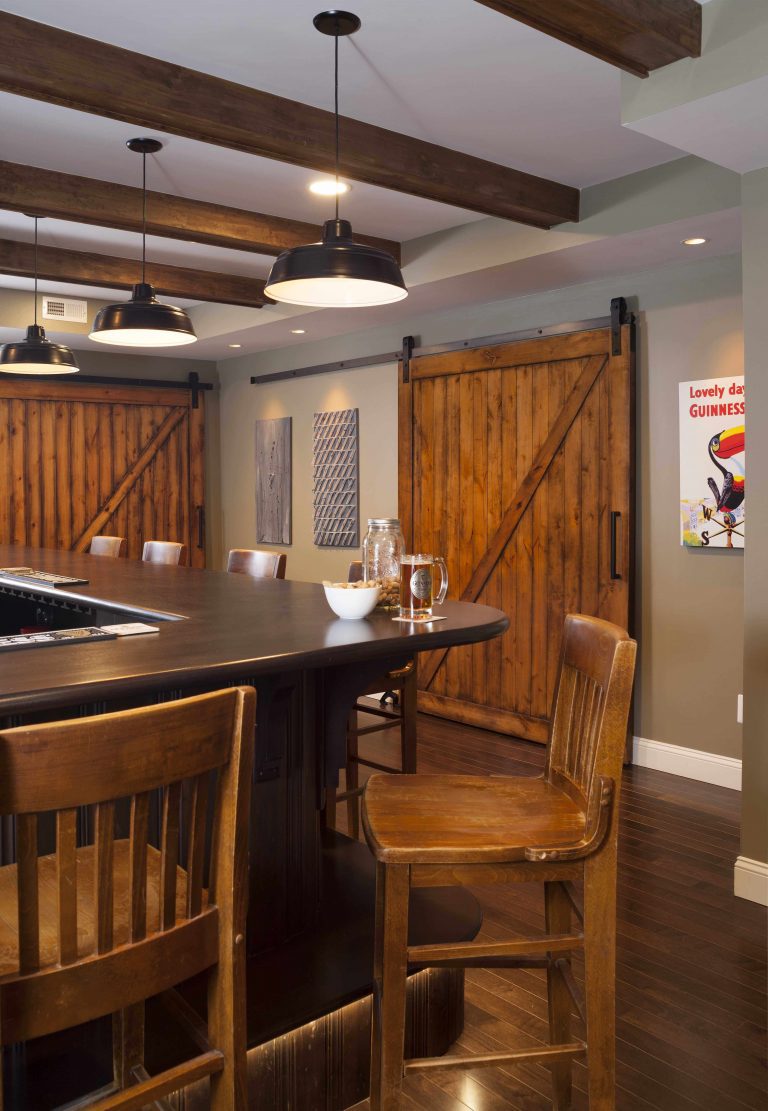 basement bar exposed beams sliding barn doors