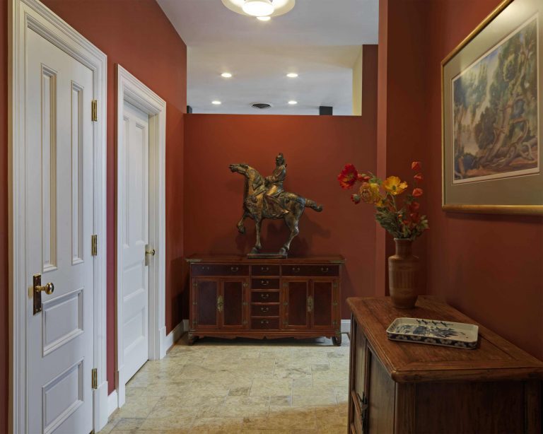 renovated hallway red walls warm color palette