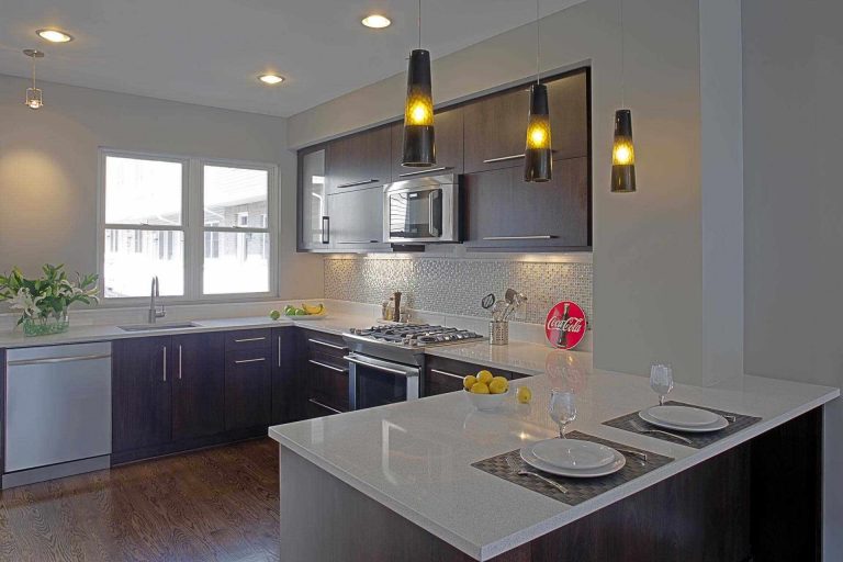 modern kitchen design with peninsula seating pendant lighting stainless steel appliances