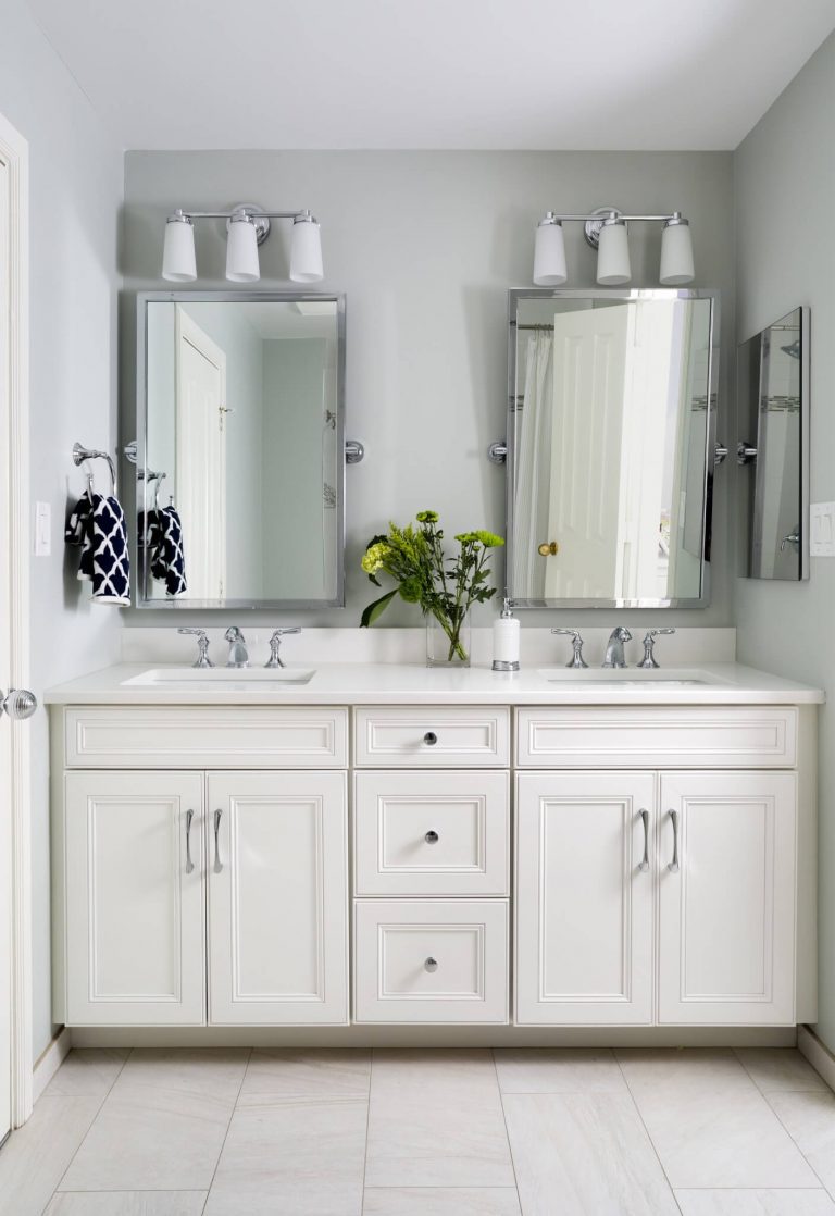 bright elegant bathroom with double sink vanity