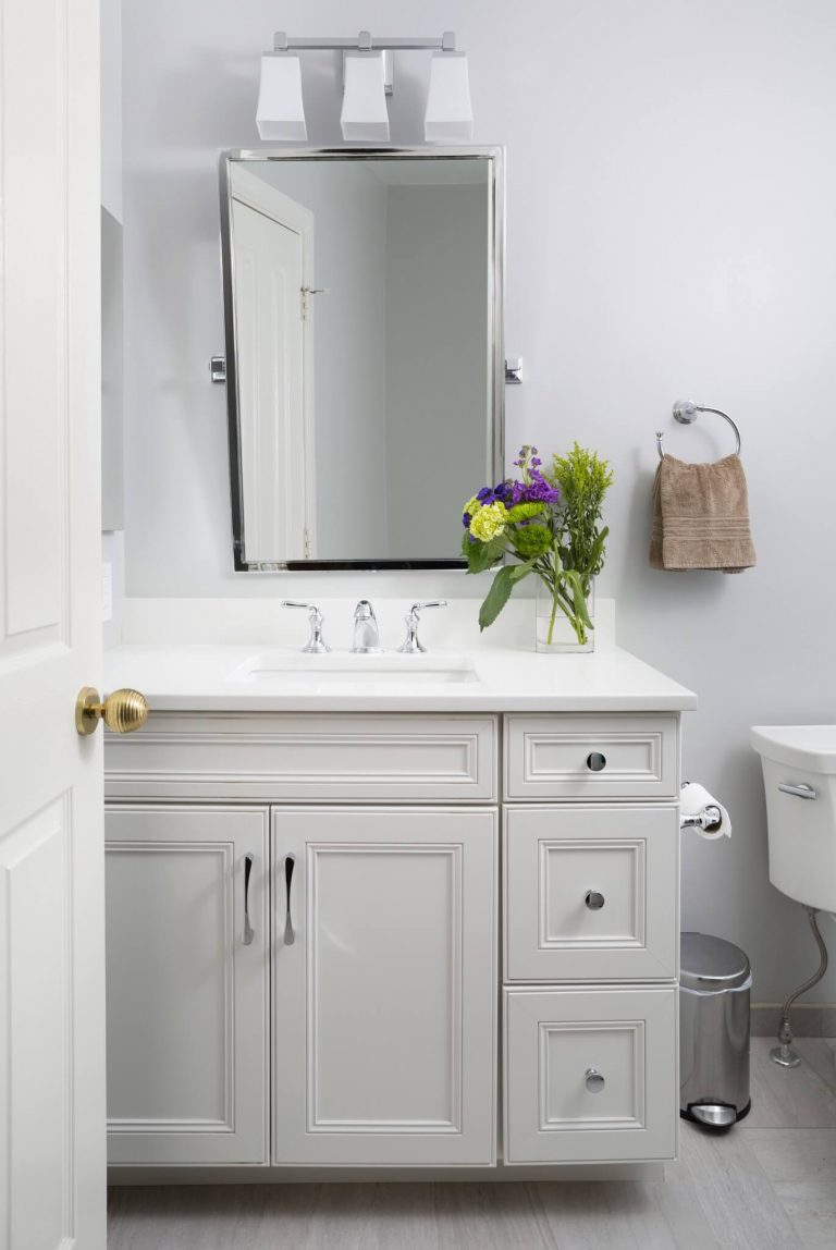 elegant farmhouse style bathroom with soft color palette grays and whites