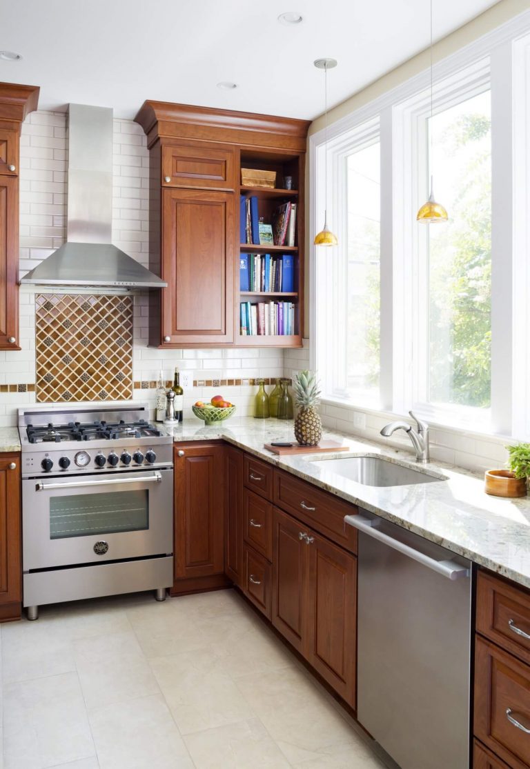 transitional style dc kitchen cherry cabinets open shelving white countertops stainless steel appliances and range hood