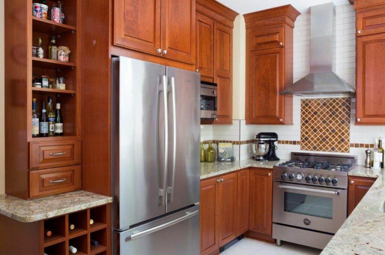 renovated kitchen warm color palette open shelving and built in wine storage