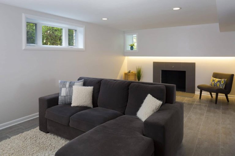 modern finished basement with fireplace in dc home soft gray color palette