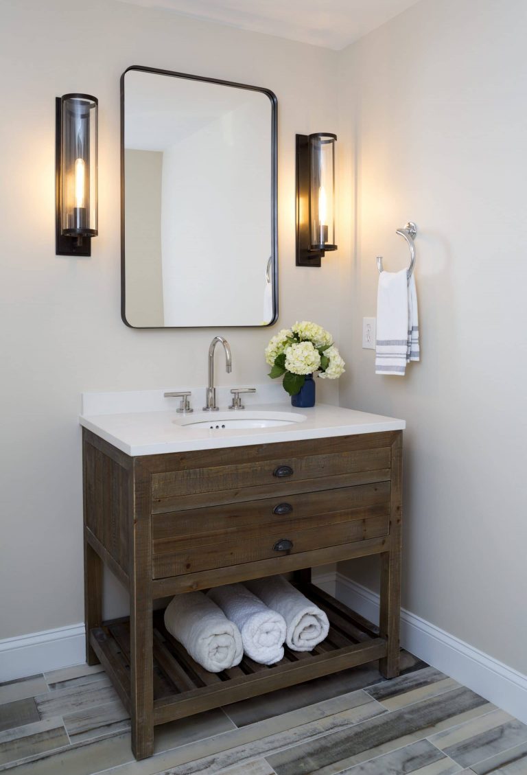transitional bathroom natural wood vanity with open storage sconce lighting
