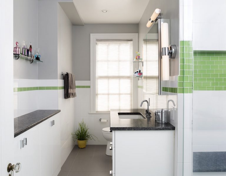 modern bathroom black and white with a pop of color and plenty of storage