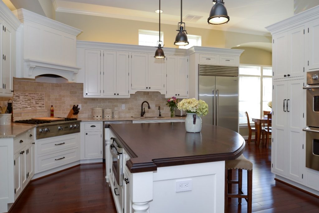 White and dark brown cabinets in kitchen