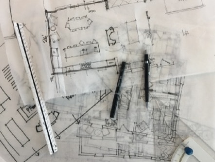 Sketches of floorplans and pens