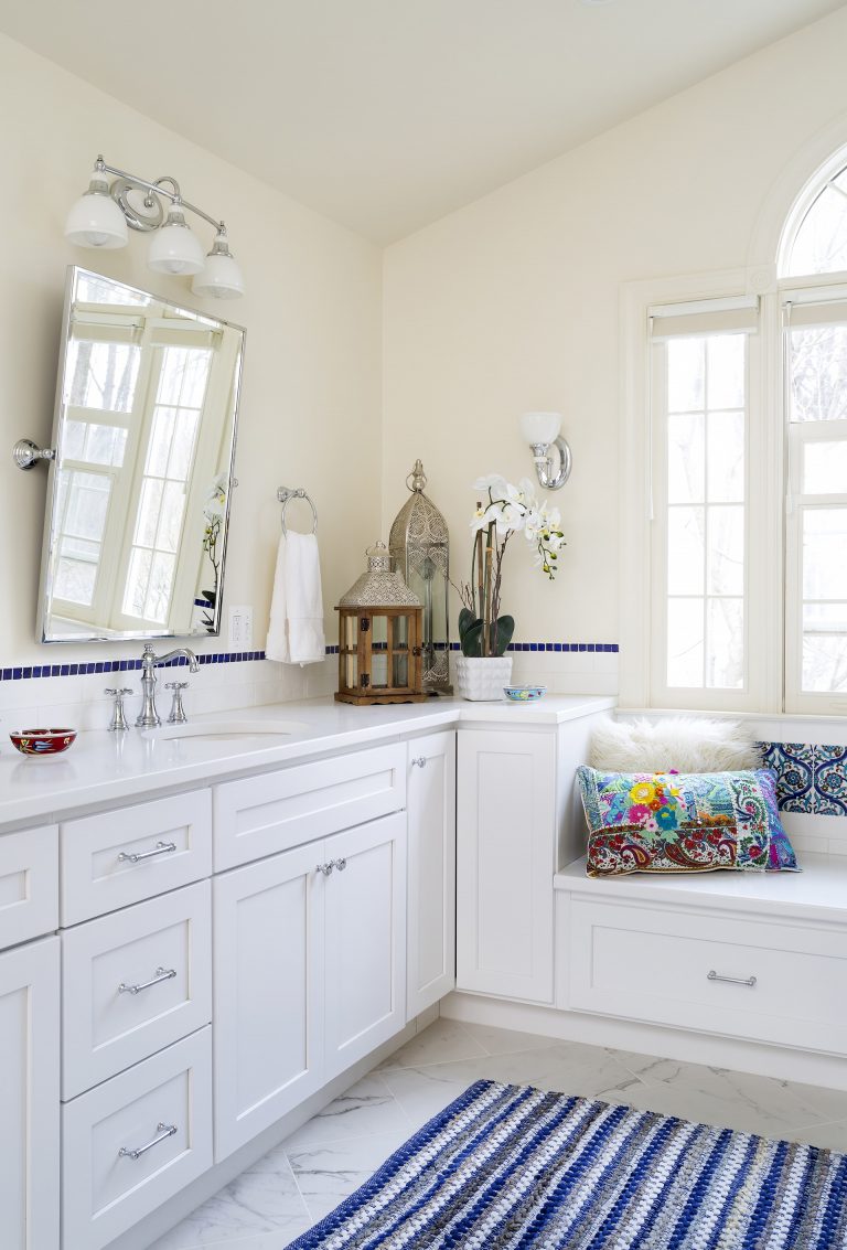 white cabinet vanity white countertops and tile bay window with built in seat
