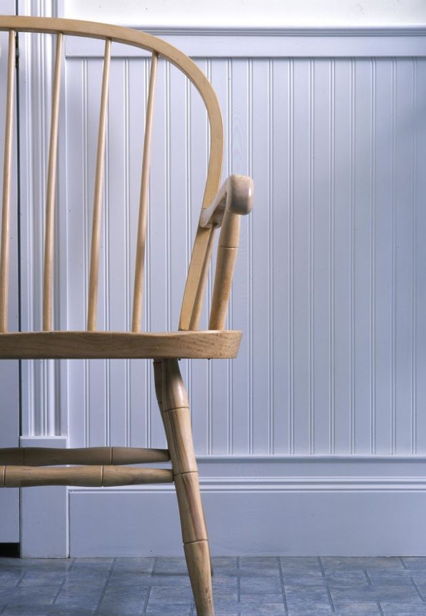 Chair with shiplap on walls
