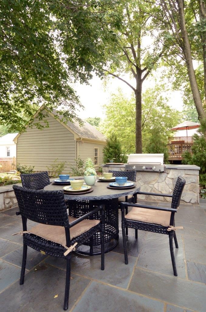 outdoor dining area and built in grill