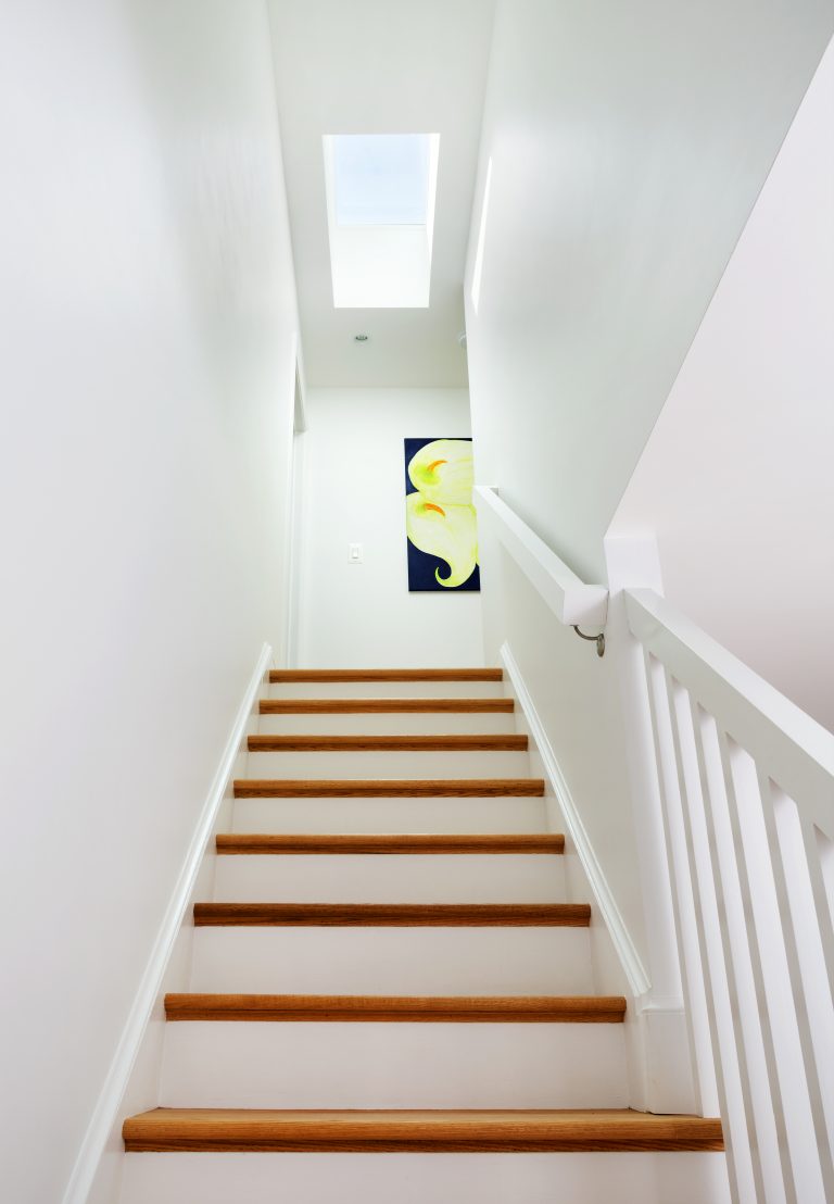 bright staircase with skylight