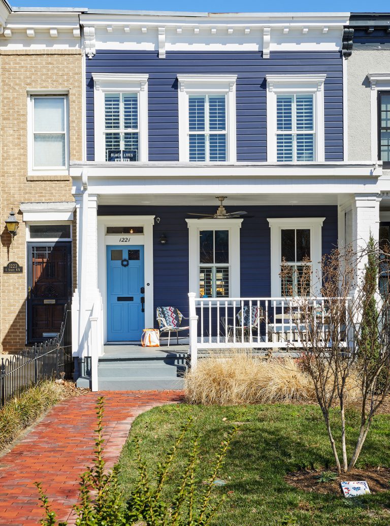 blue DC town home with brick pathway