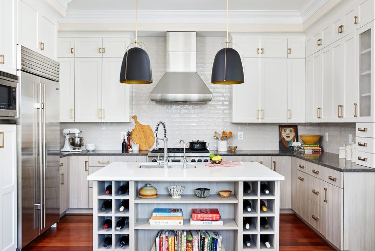 white kitchen with wood floors stainless steel appliances island with open shelf storage