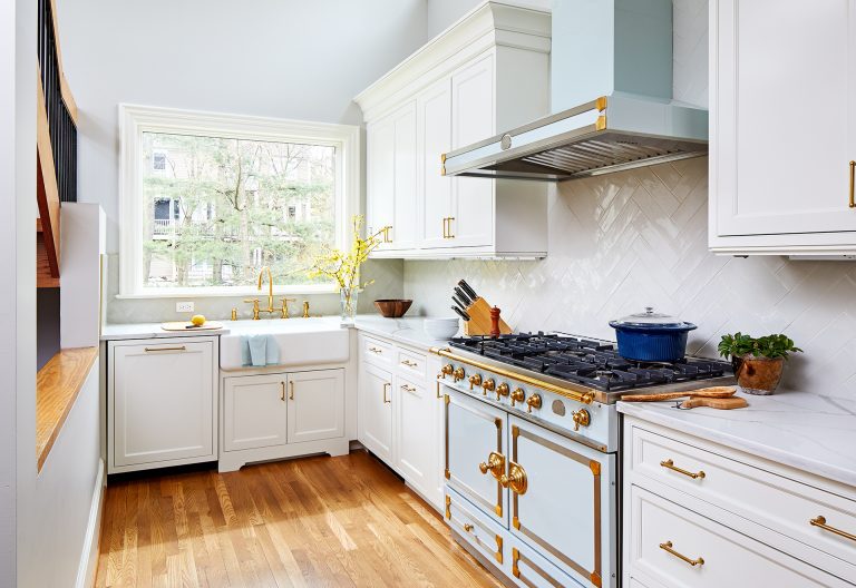 robins egg blue and gold range and hood focal point diamond tile backsplash