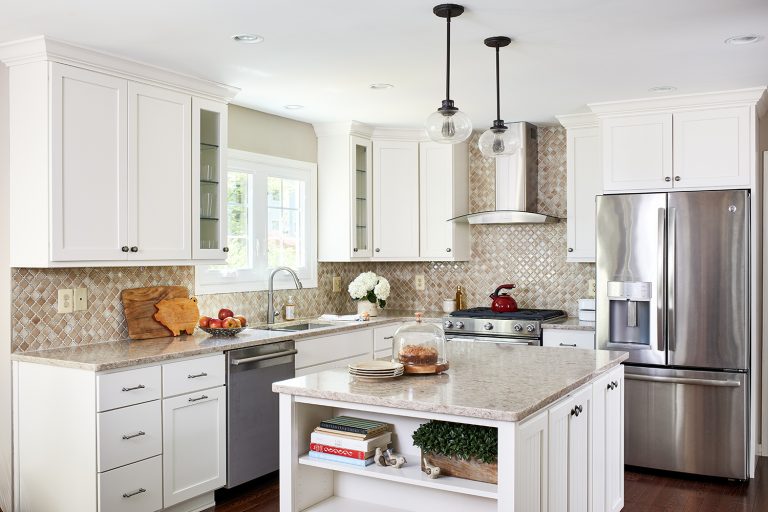 neutral color scheme kitchen with white cabinetry and island with open shelving on side