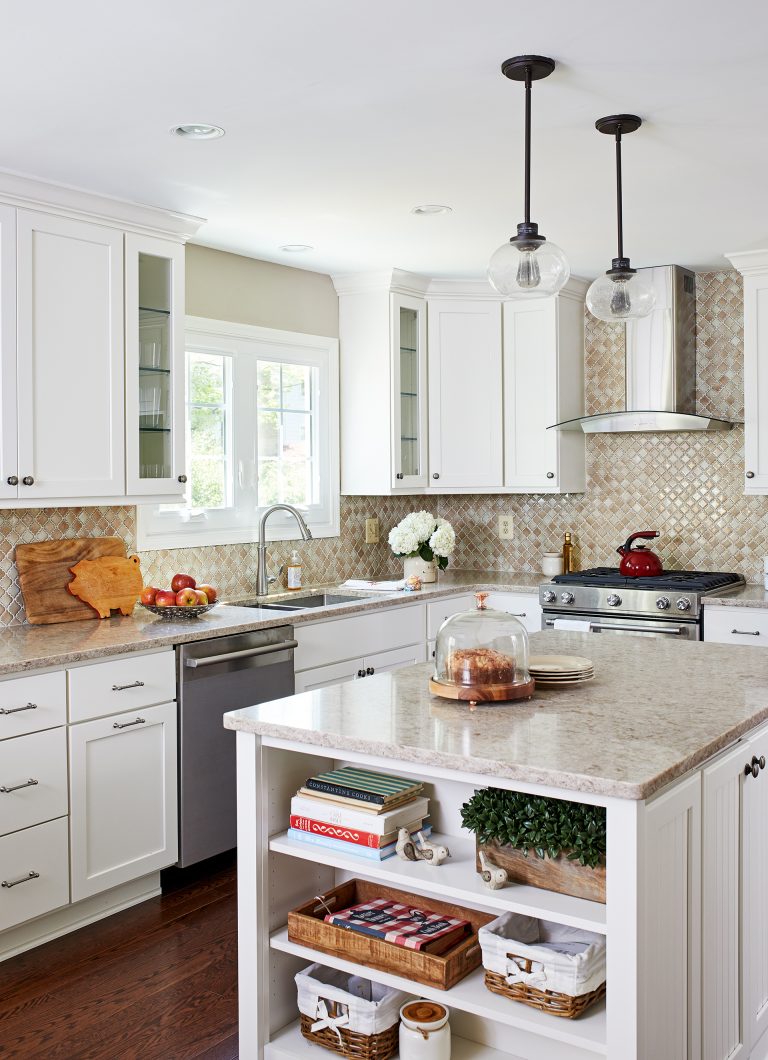 neutral color scheme kitchen with white cabinetry and island with open shelving on side
