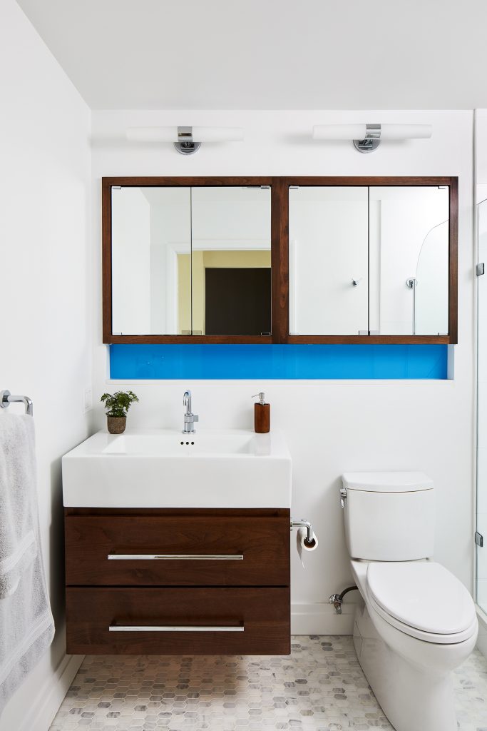 dc remodeled bathroom with dark wood floating vanity