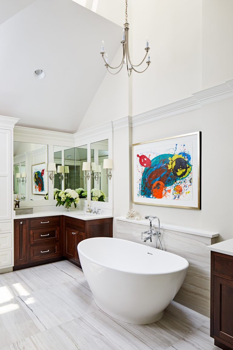 bathroom renovation ideas with a gorgeous freestanding tub along with a chandelier right above it sits between two vanity