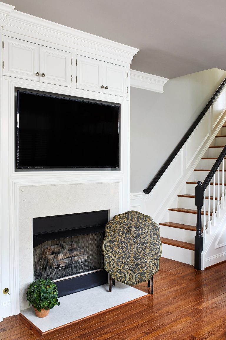 floating tv with cabinets above, electronic fireplace