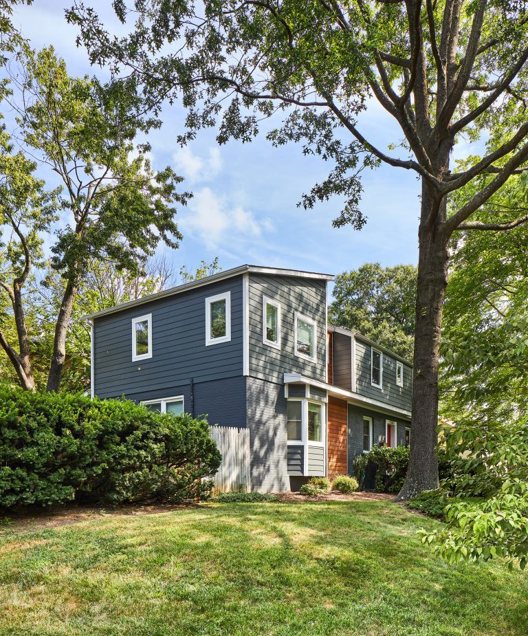 side view of second floor addition with modern sloped roof