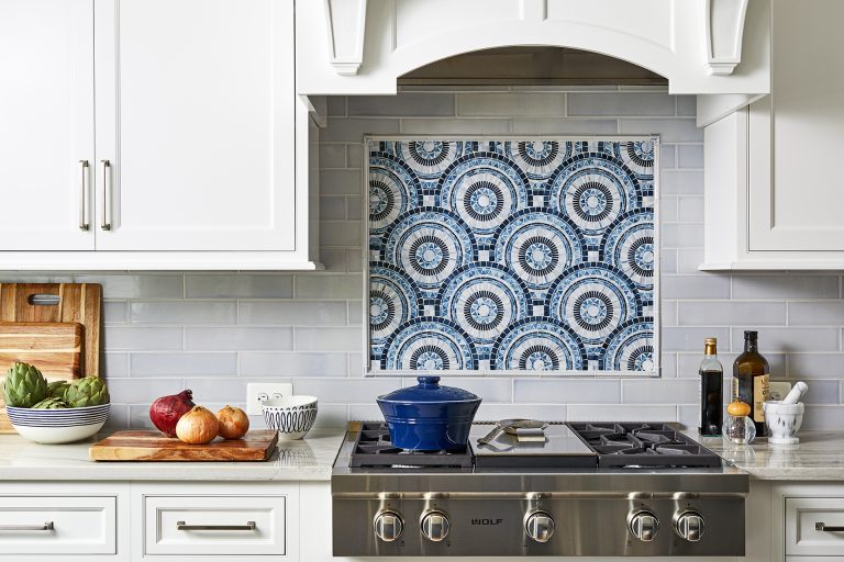 kitchen design ideas with subway tiles, blue and white backsplash, white cabinets with pull handles