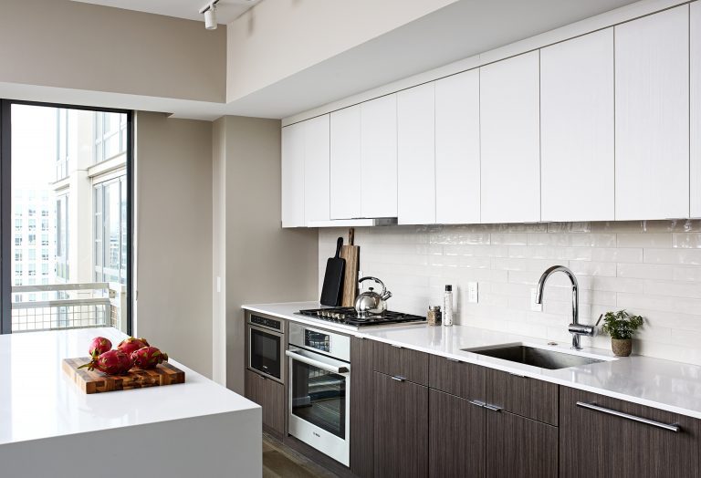 best kitchen remodeling dc with white brick backsplash and white granite countertops
