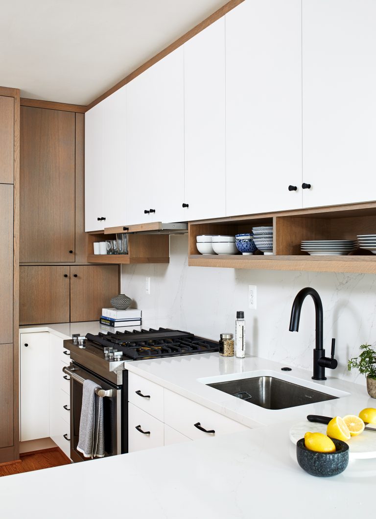 thin sleek pull-out range hood, white and brown cabinets with hanging shelves